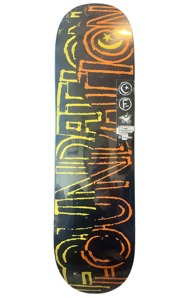 FOUNDATION Distress Deck skateboard with bold orange and yellow graphic on black background, 8.5-inch durable design