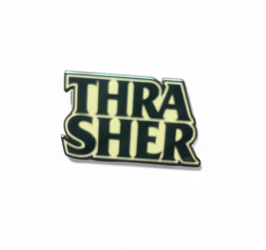 THRASHER Anti Hero black and white lapel pin with bold logo design